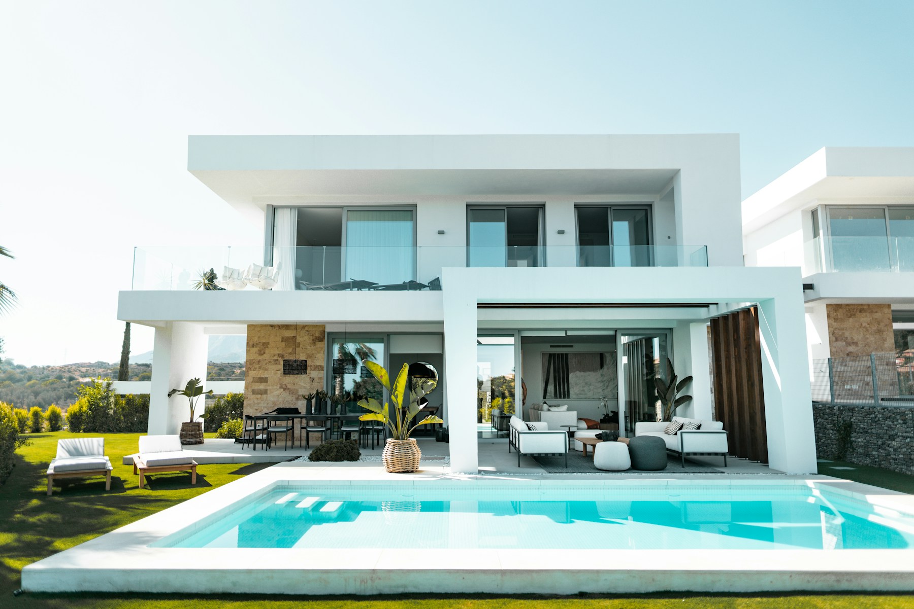 Distinctive contemporary residential architecture framed by greenery