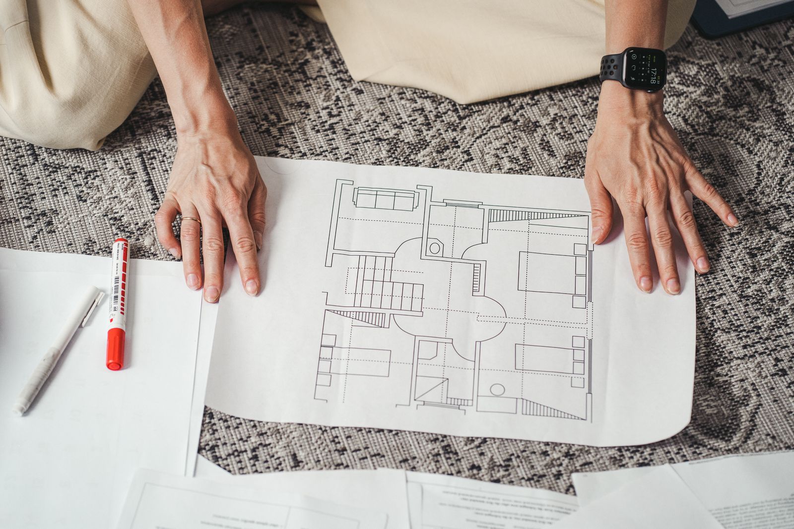 Architectural plans and design materials for a home assessment