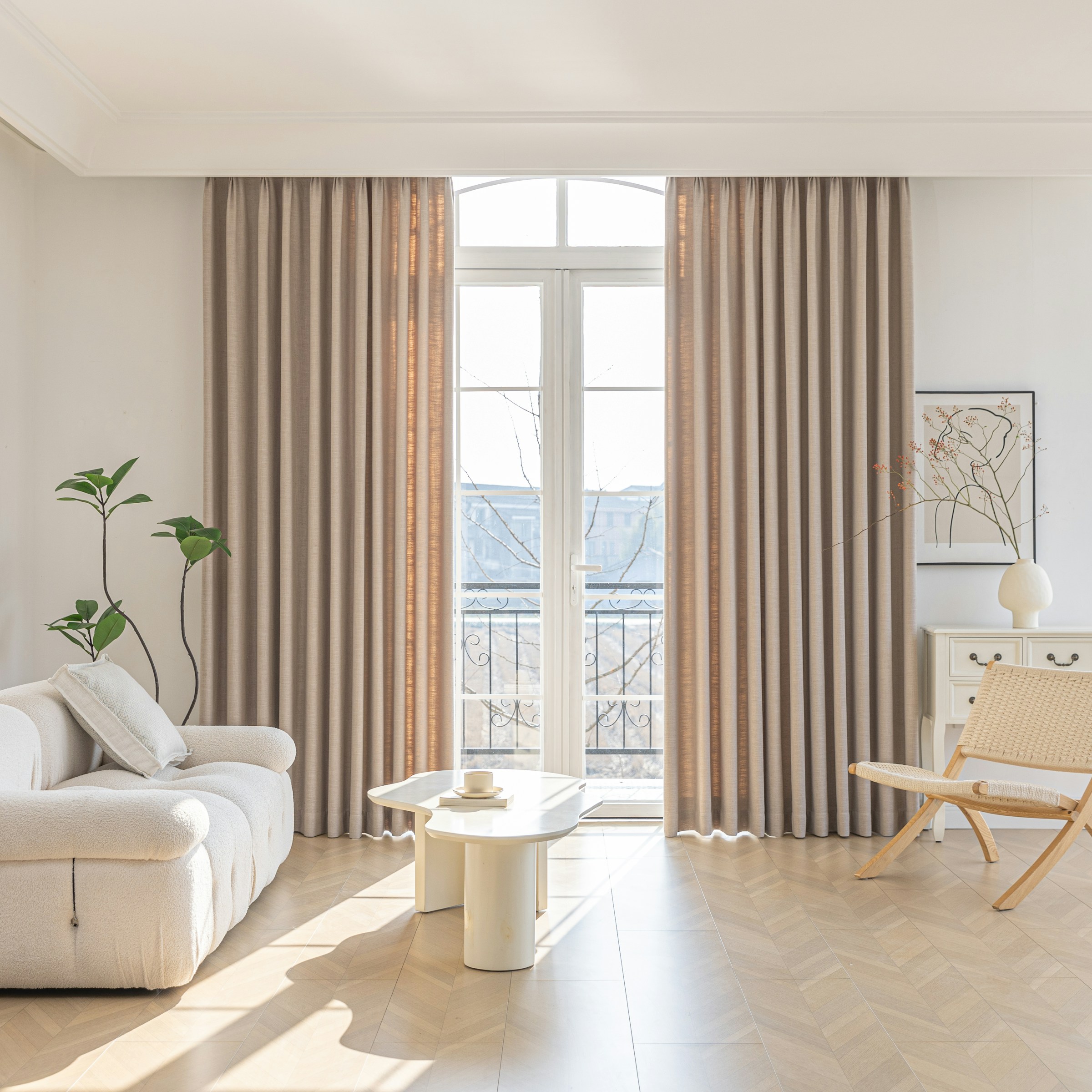 Sunlit living room with natural materials and generous windows