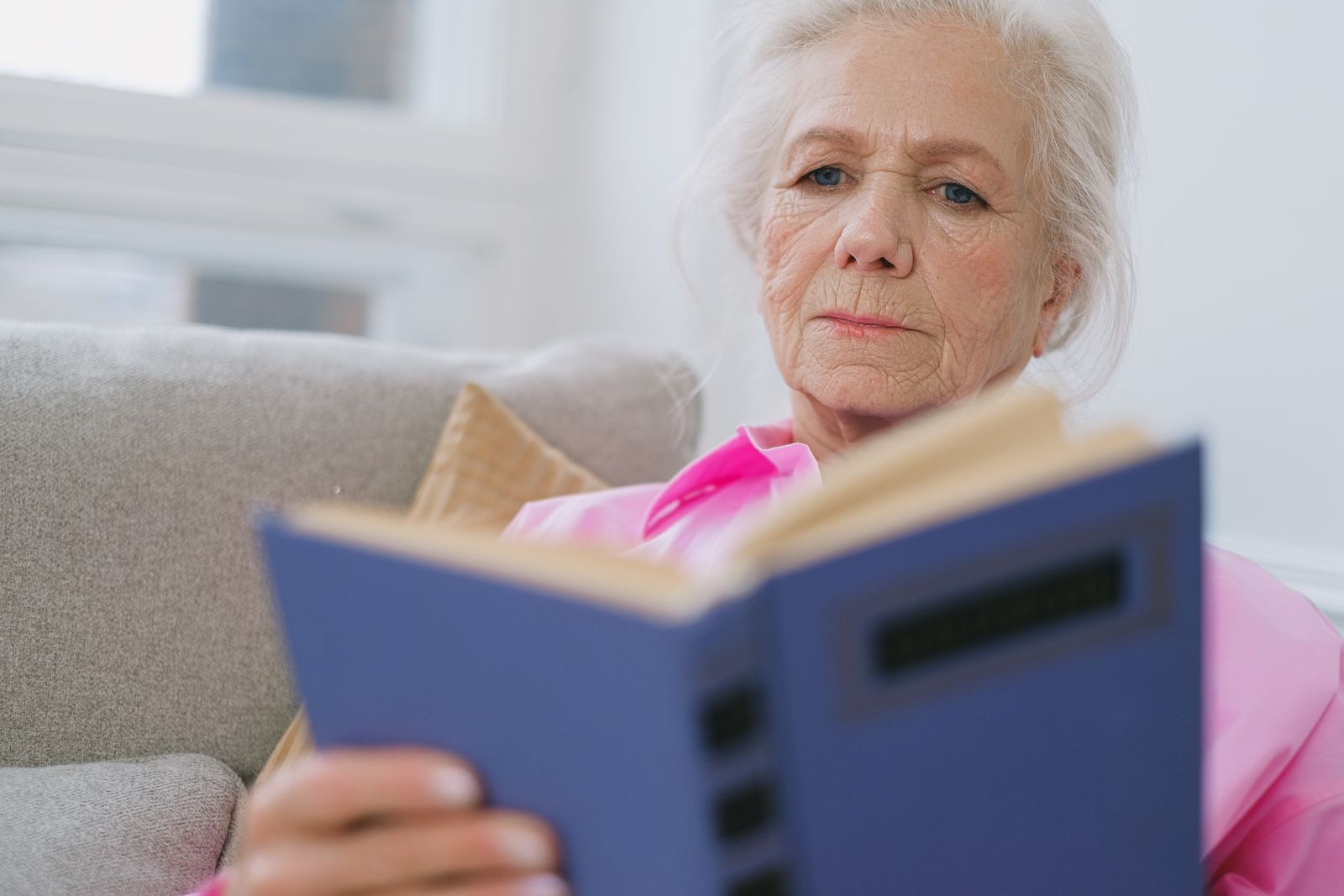 Editorial photograph of an older adult in an everyday home setting